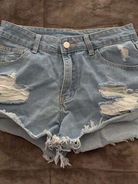 SHEIN Light Blue Ripped Denim Cutoff Shorts